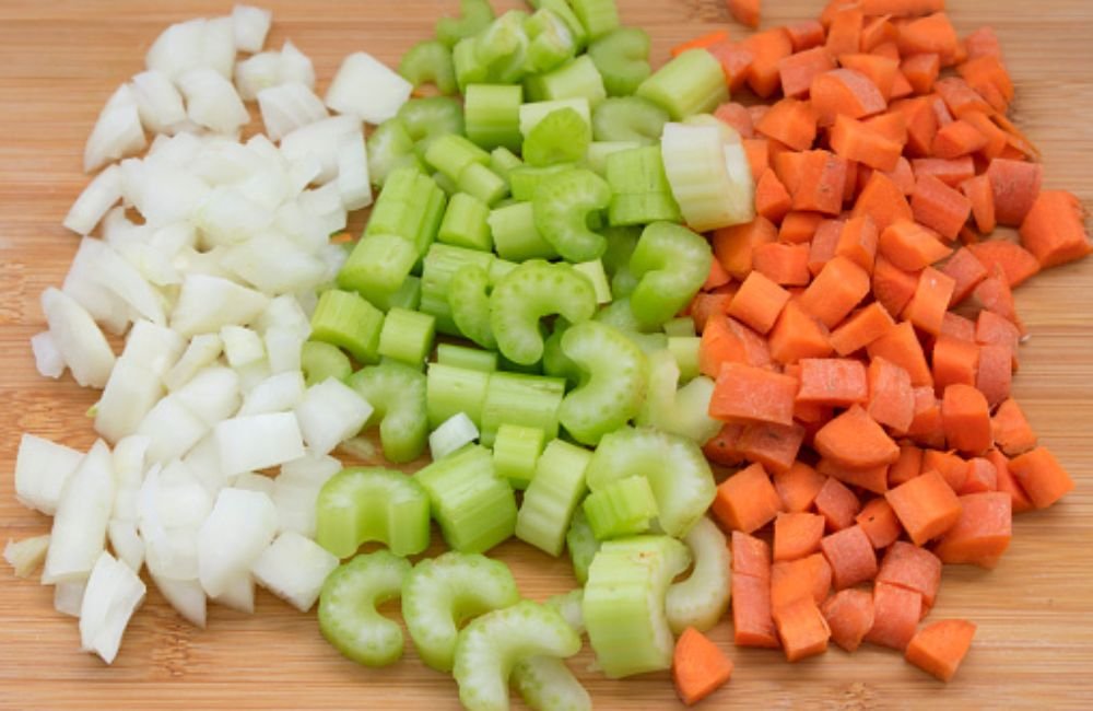 Chopped onion carrot and celery for mirepoix base