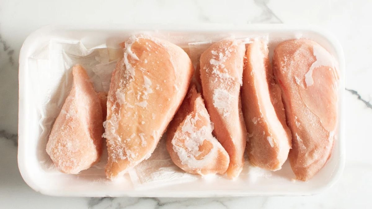 Frozen chicken breasts ready for boiling and cooking”